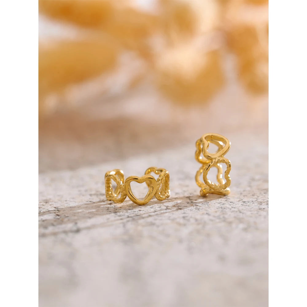 Minimalist heart ear clip on design with smooth golden tone