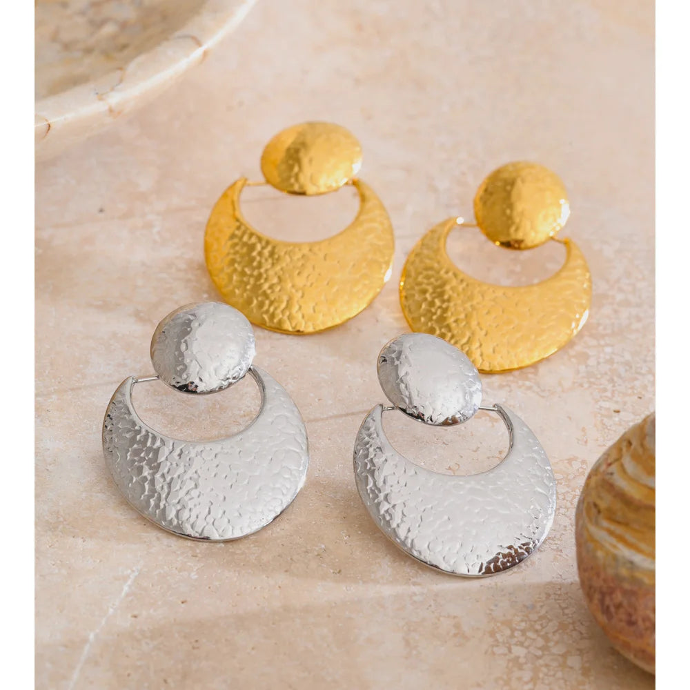 Elegant gold earrings with modern geometric design and hammered metal