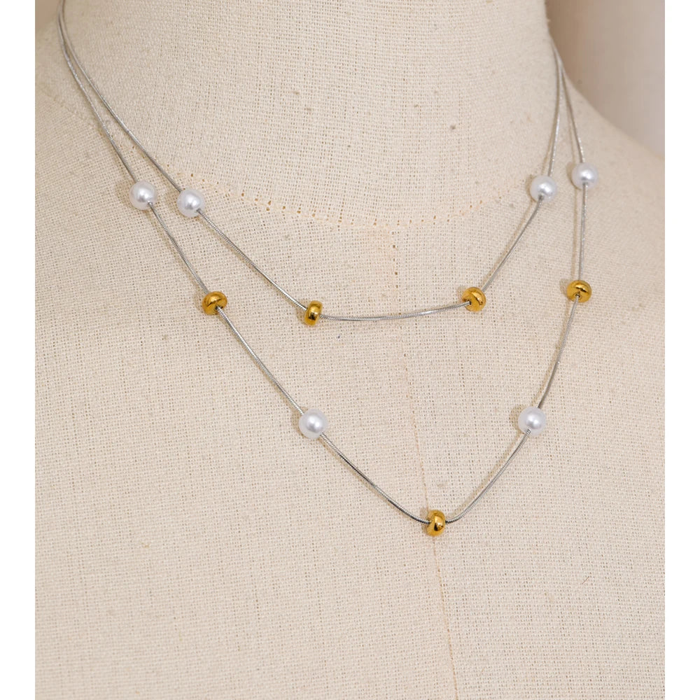 Stylish necklace women look featuring layered pearls