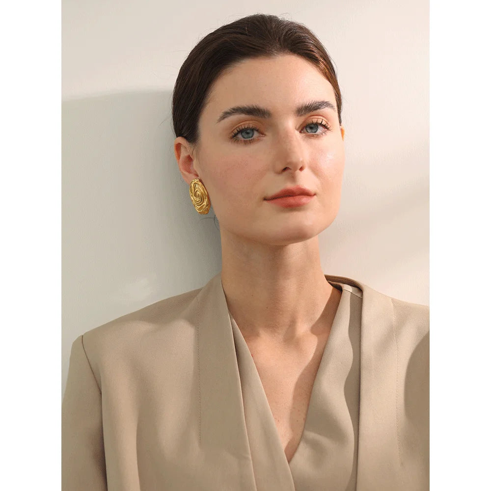 Stainless steel earrings with subtle stripe finish