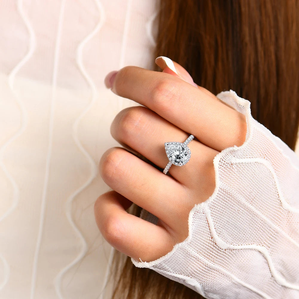 Side angle showing ring engagement ring lines on a moissanite ring