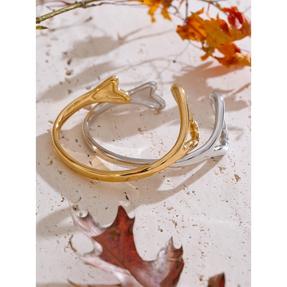 Close-up of gold heart bracelet in stainless steel jewelry design