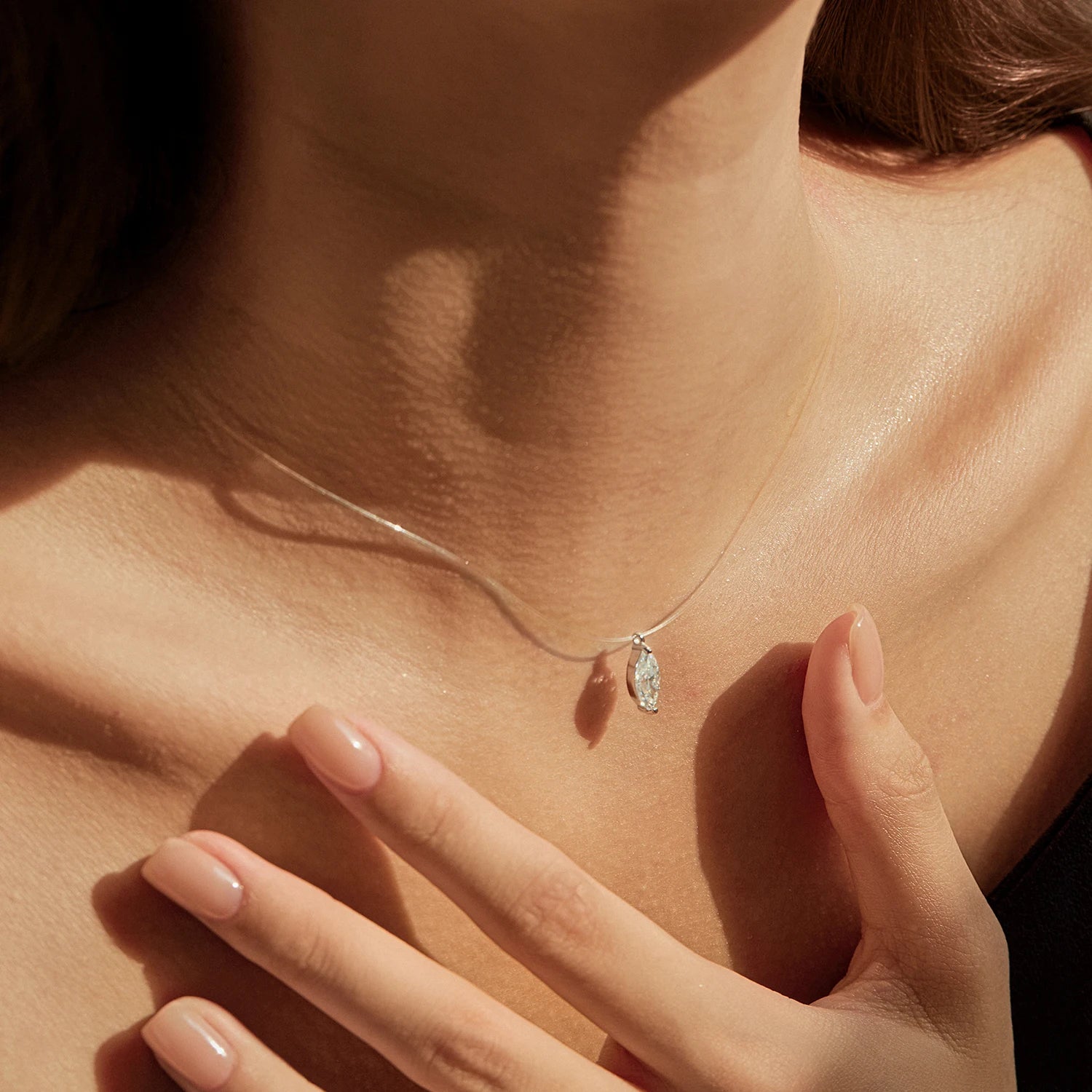 Elegant sterling silver necklace with marquise moissanite diamond