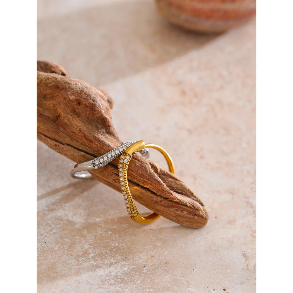 Slender gold ring featuring cubic zirconia stones for understated elegance