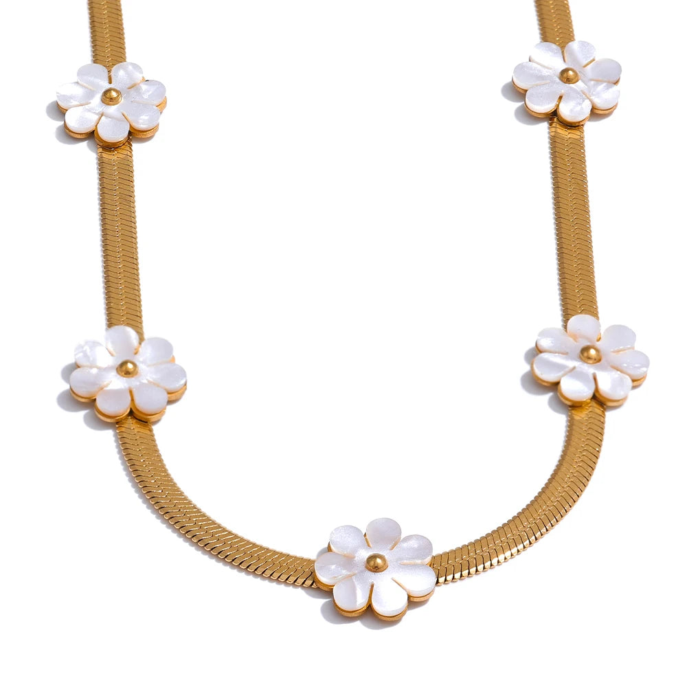 Classic flower necklace shining in a gold jewelry arrangement