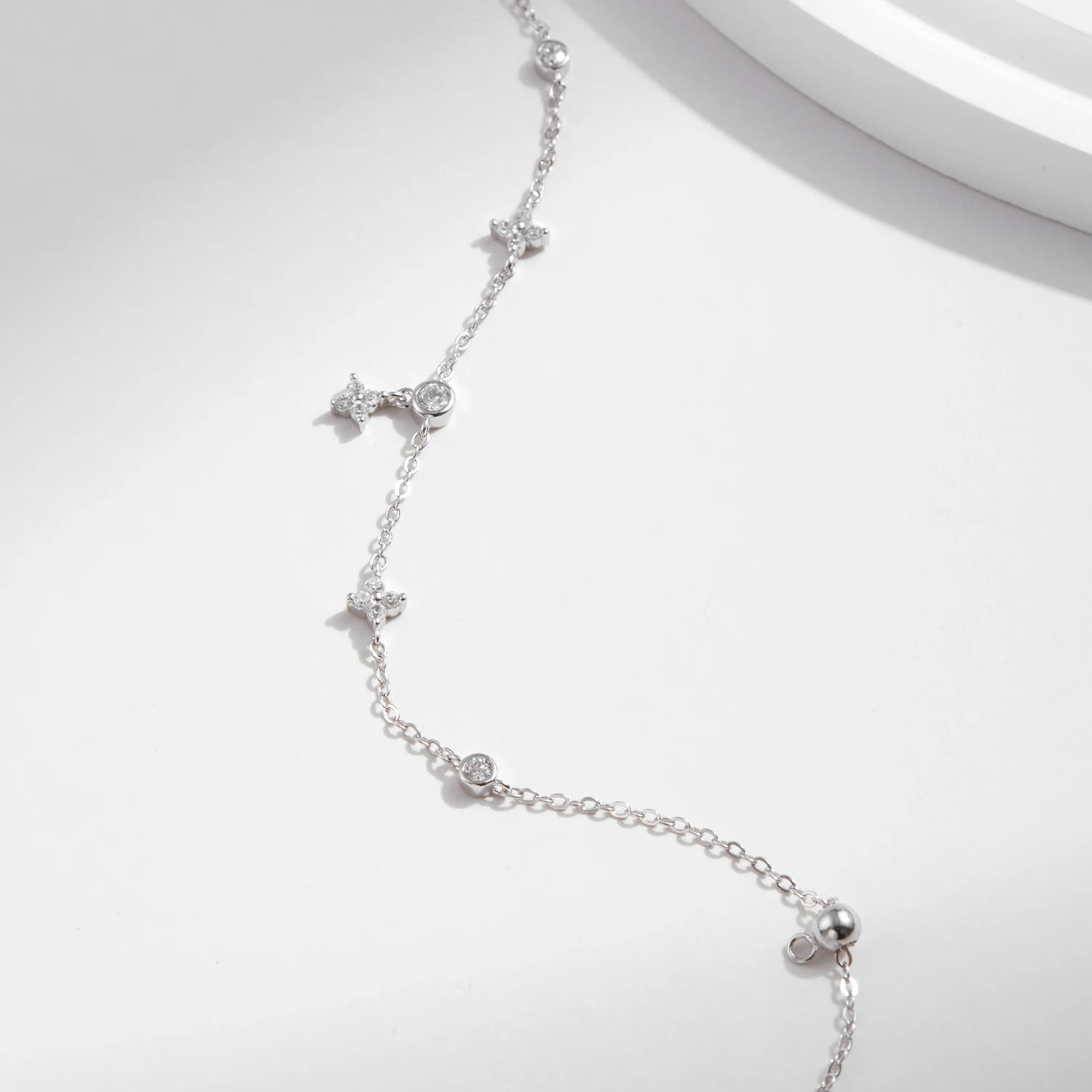 Slim 925 sterling silver clover bracelet with luminous cz details