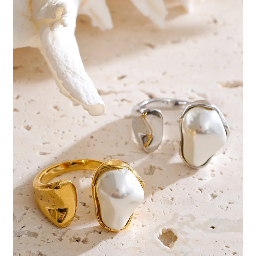 A pearl ring with antique baroque detailing