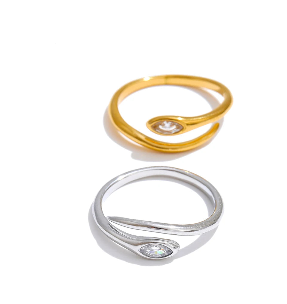 Ring with gold snake silhouette and shimmering stones