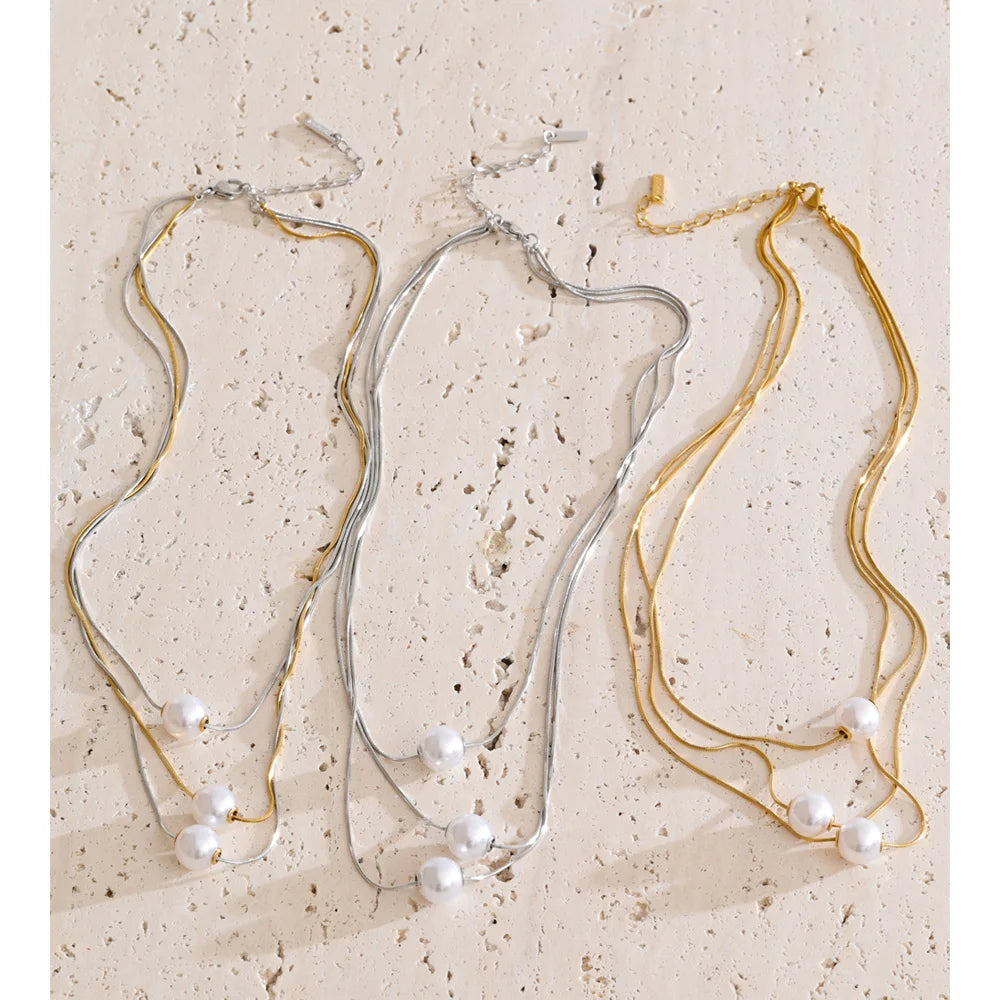 Stainless steel jewelry necklace with layered pearls