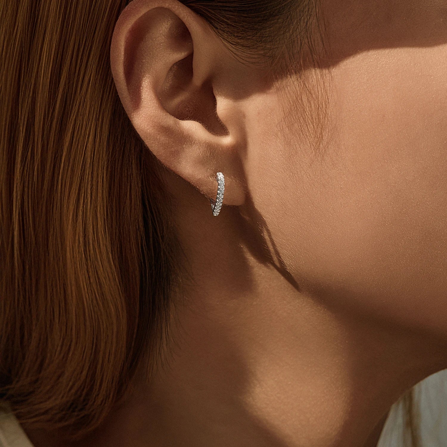 Sparkling sterling silver hoop earrings with moissanite diamond