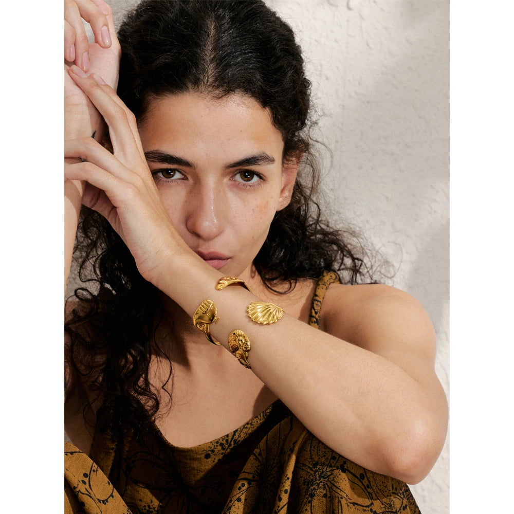 Gold bracelet bangle look with soft gold plated glow on a cuff