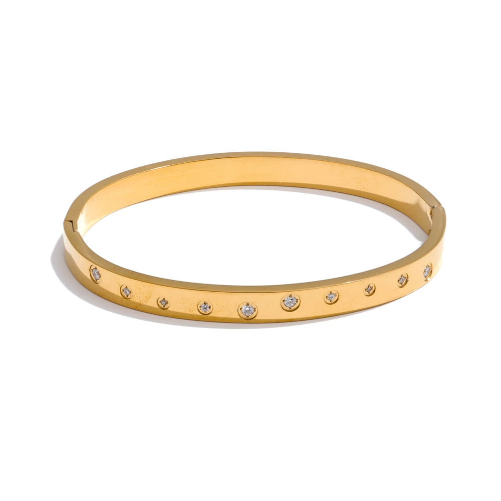 Gold plated stainless steel bangle bracelet with cubic zirconia