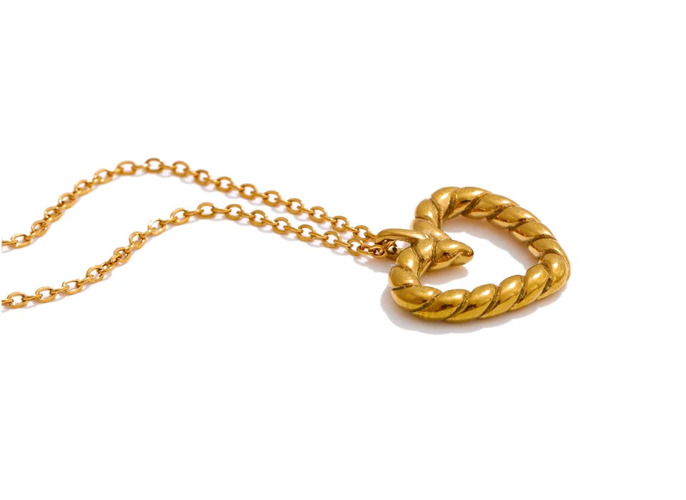 Necklace heart design presented as a charm on necklace accent