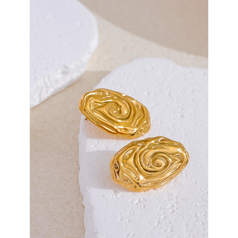 Stainless steel stud earrings that pair with gold earrings