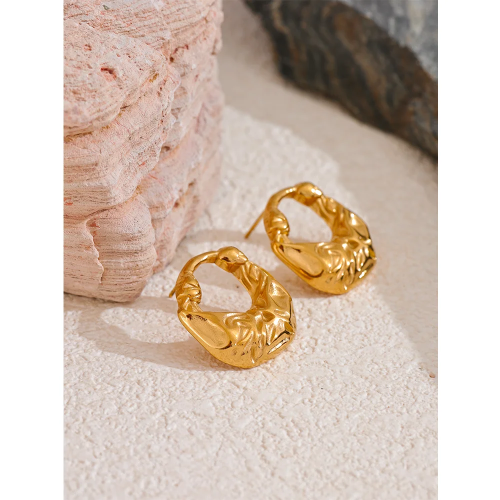 Polished ear rings in a clean gold plated stud earrings look