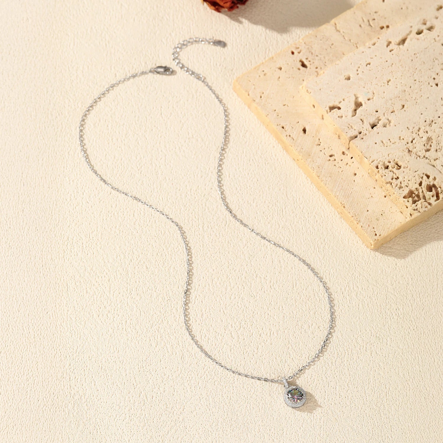 Women necklace combining moissanite jewelry charm and classic silver chain