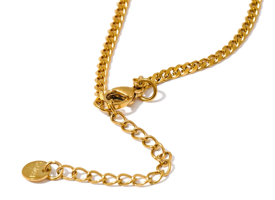 Gold necklace necklace design featuring floral charm