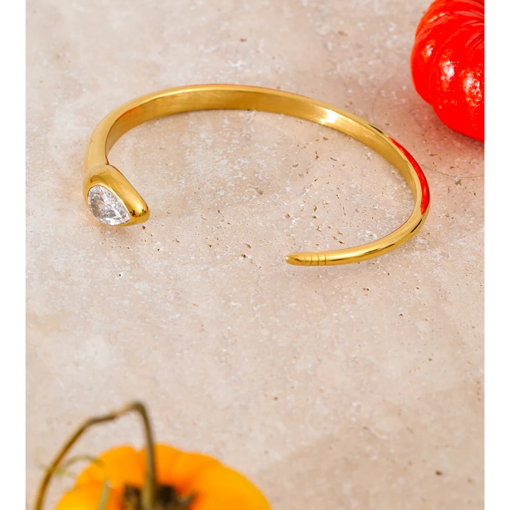 Close up of cubic zirconia on snake inspired bangle bracelet