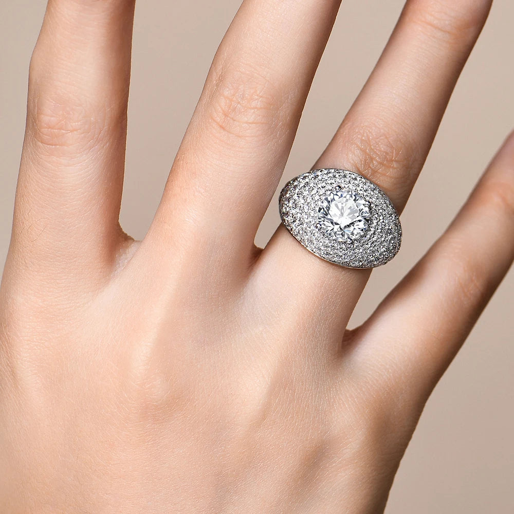 Rings with moissanite jewelry shine under light in silver setting