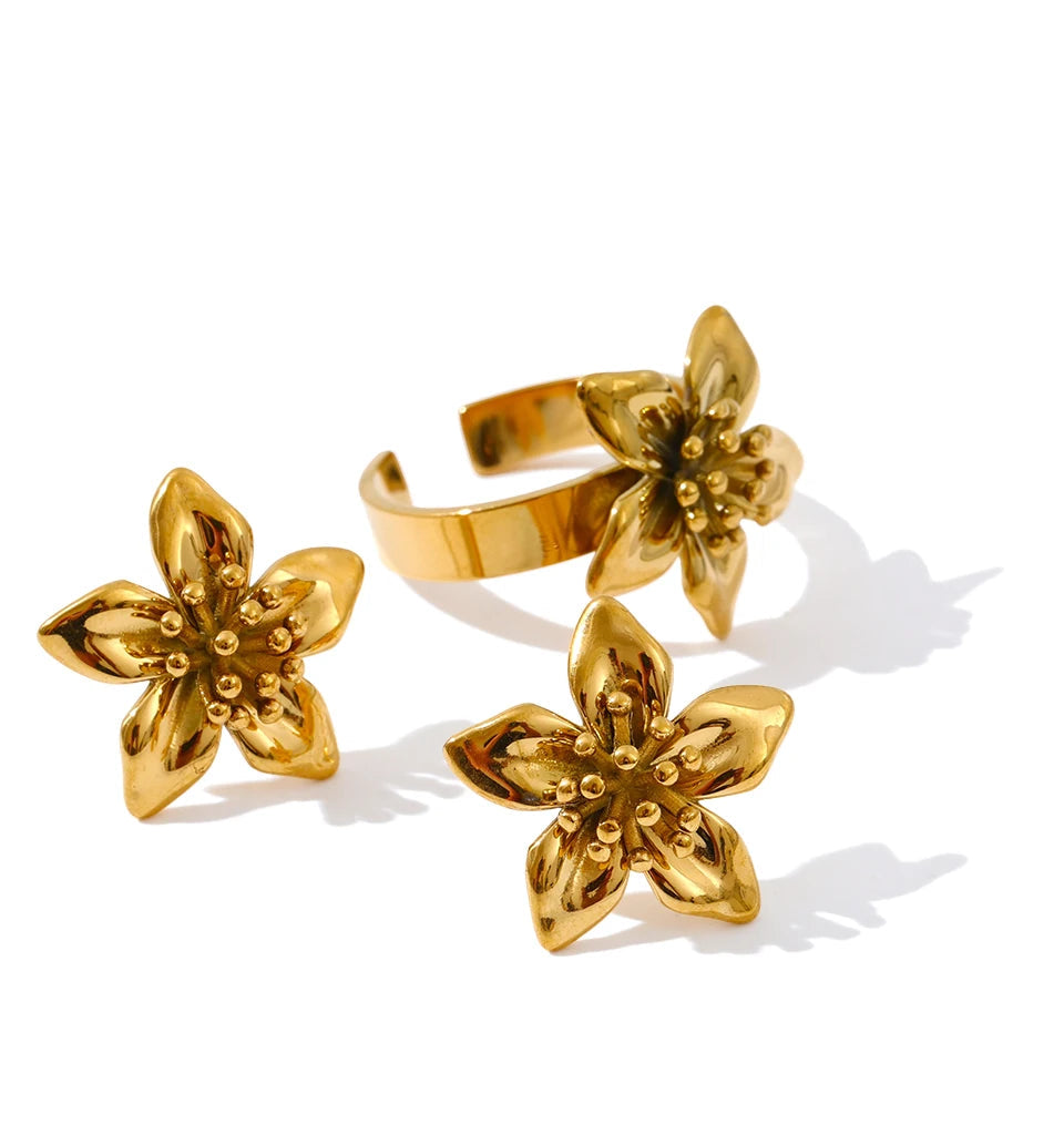 Lifestyle photo showing golden golden ring stacked with gold rings gold