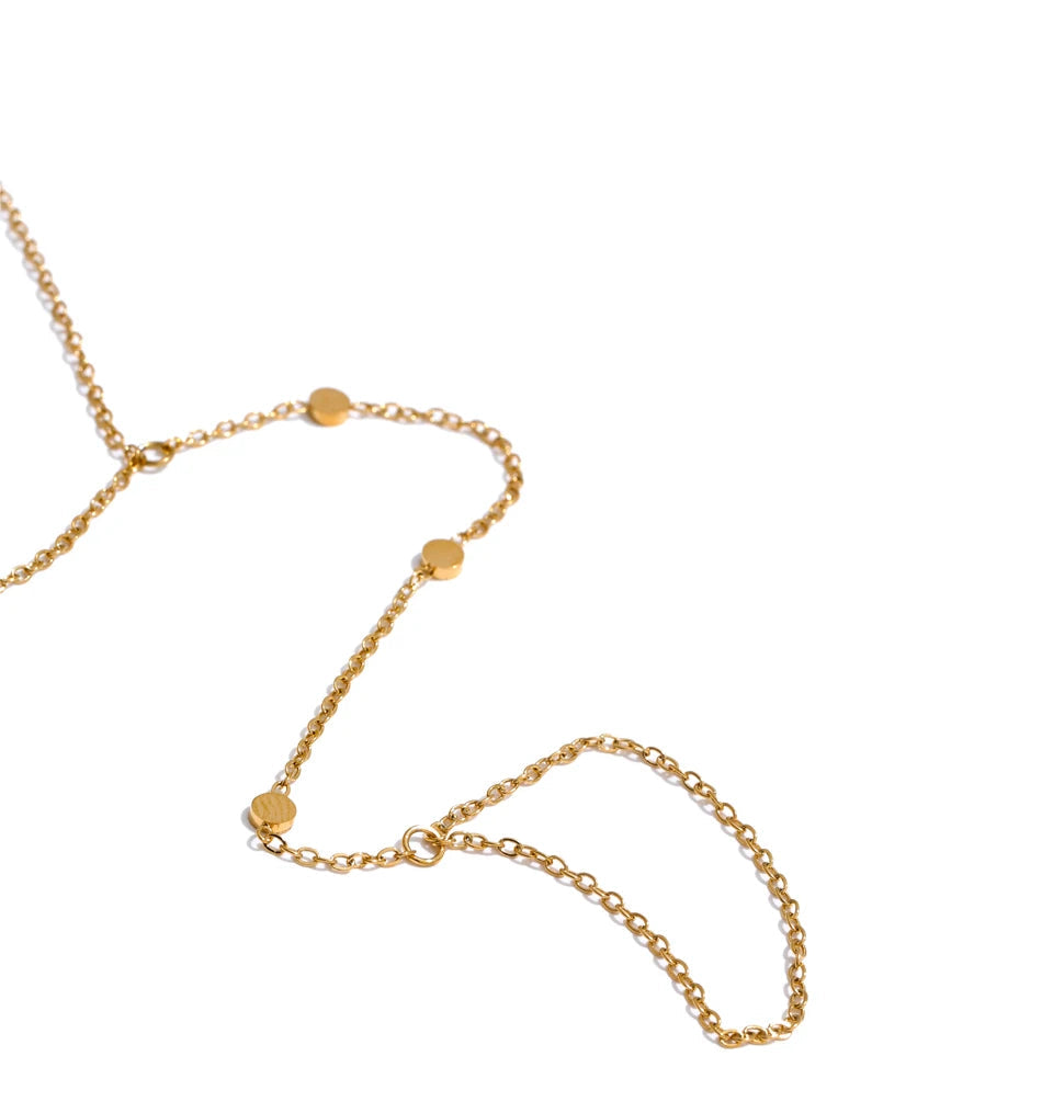 Wrist shot featuring women with bracelet styling and chain with hand flow