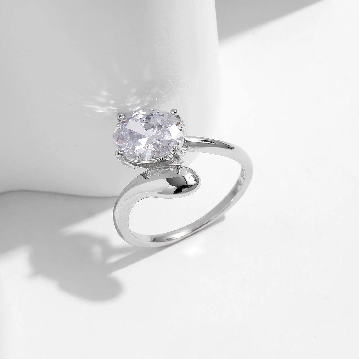 Silver color ring with size options displayed beside ring size from ring chart