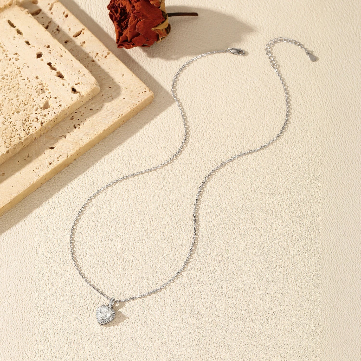 Women necklace combining moissanite jewelry charm and classic silver chain