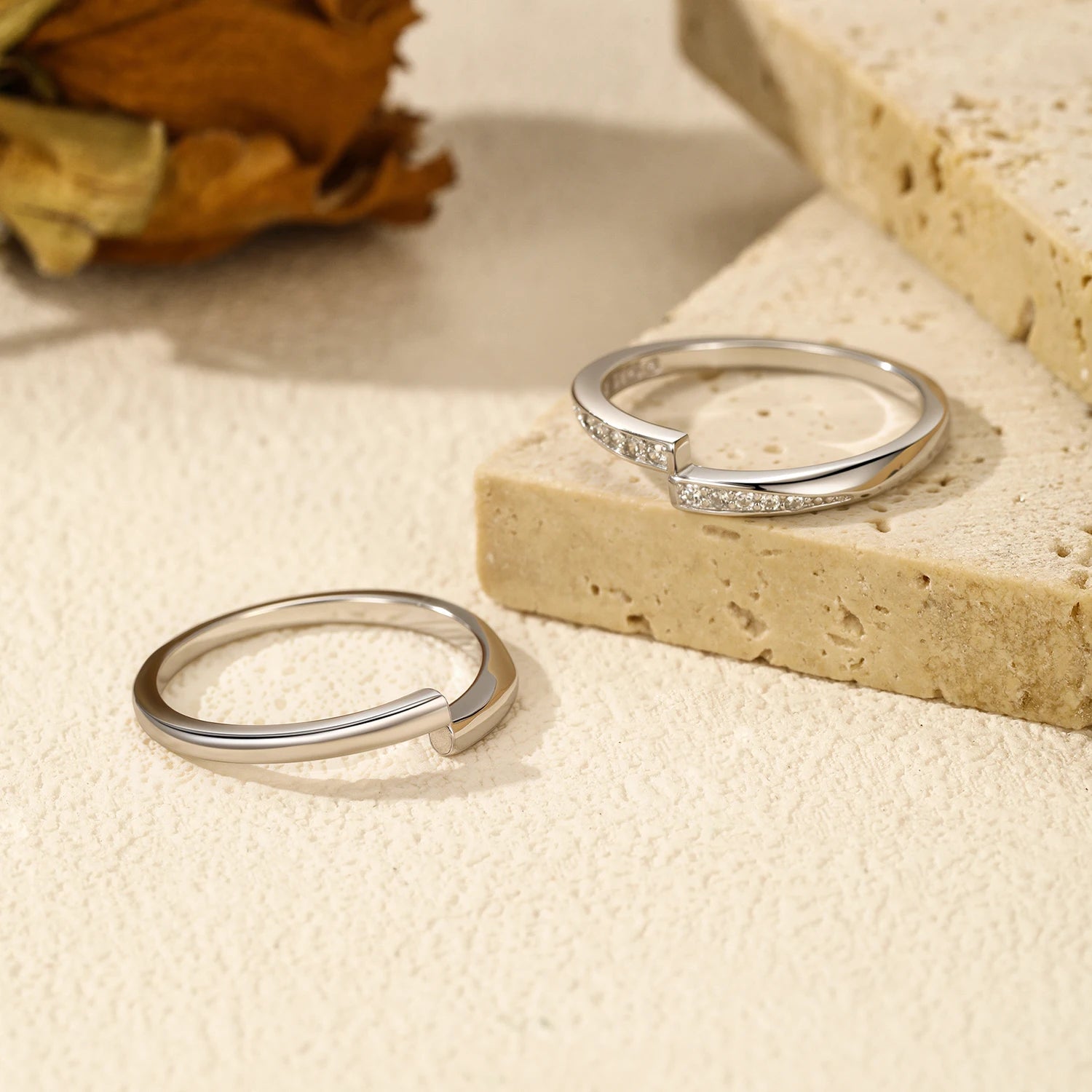 Couple of rings set featuring ring with silver and ring size