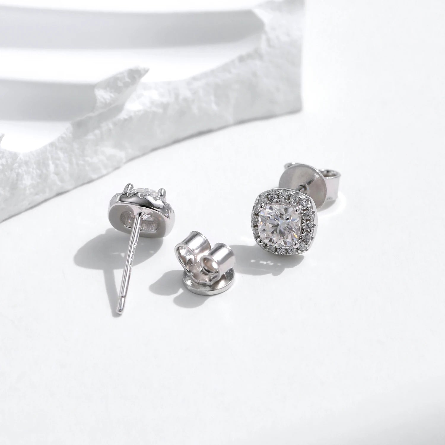 Macro detail of square cut sparkle on earrings diamond earrings