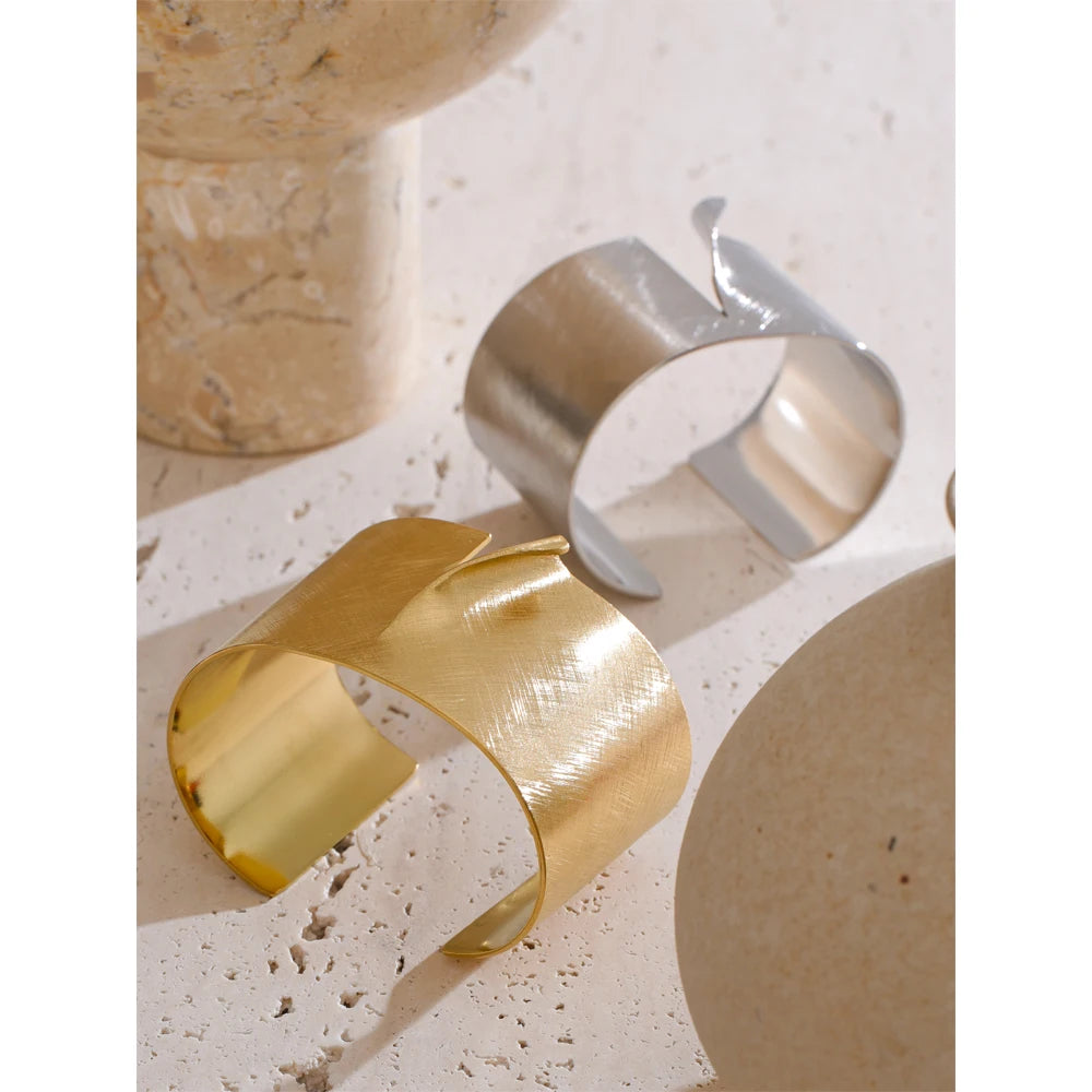 Clean background of gold plated bracelet cuff as a gold bracelet bracelet accent