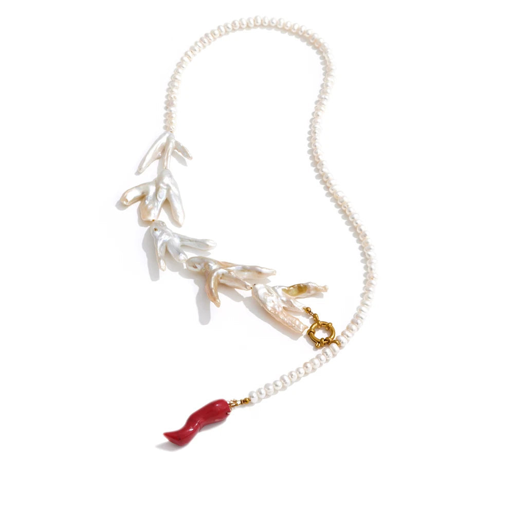 Handmade baroque pearl jewelry showing pearl on a necklace softly glowing