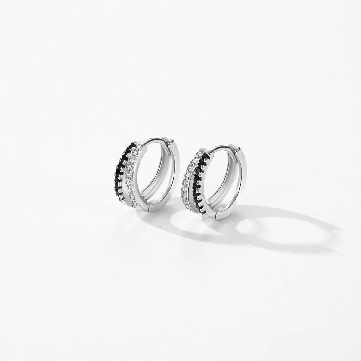 Sterling silver earrings with polished silver color zirconia shine