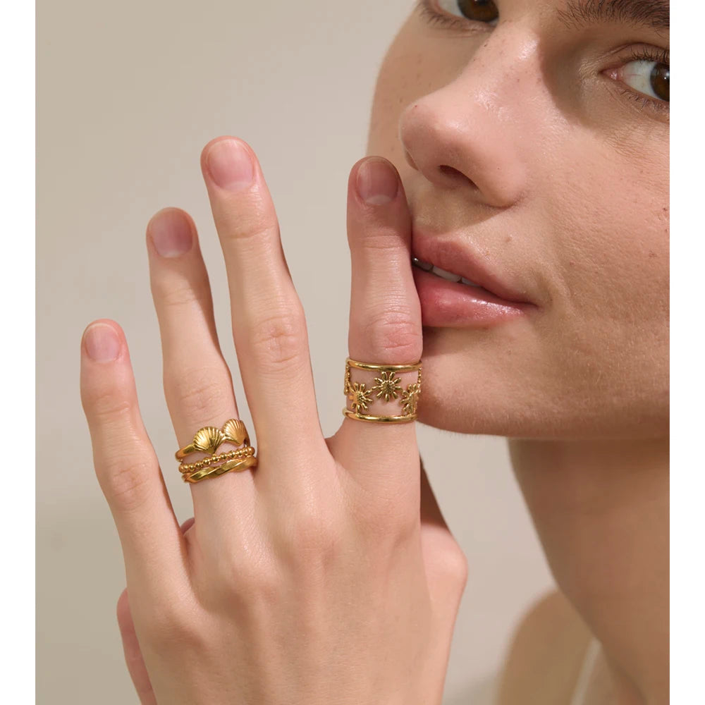 Adjustable open band styled as gold and ring and finger and ring accessory