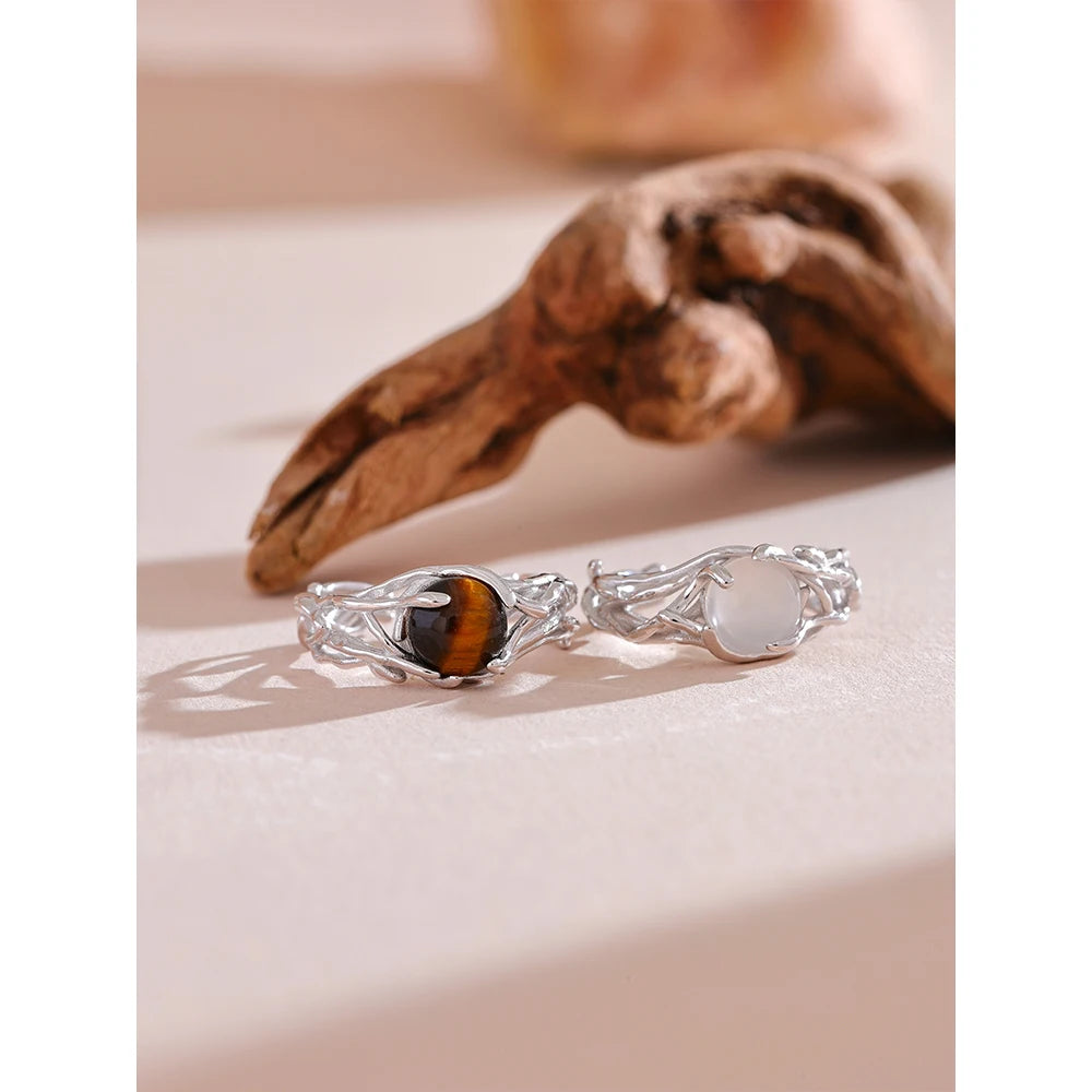 Tiger eye stone centered on a refined sterling silver ring
