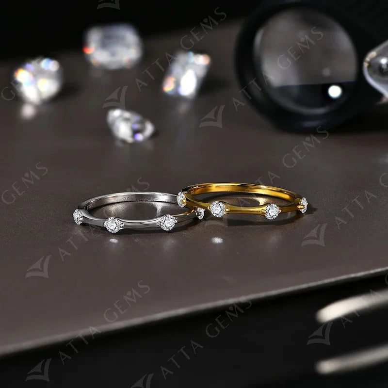 Sterling silver wedding ring with round moissanite sparkle