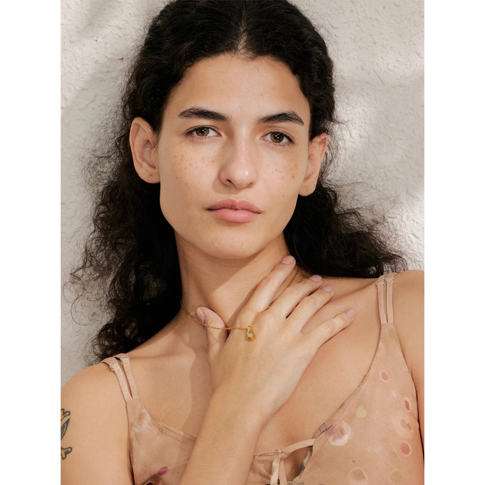 Necklace and pendant design with elegant crystal drop centerpiece