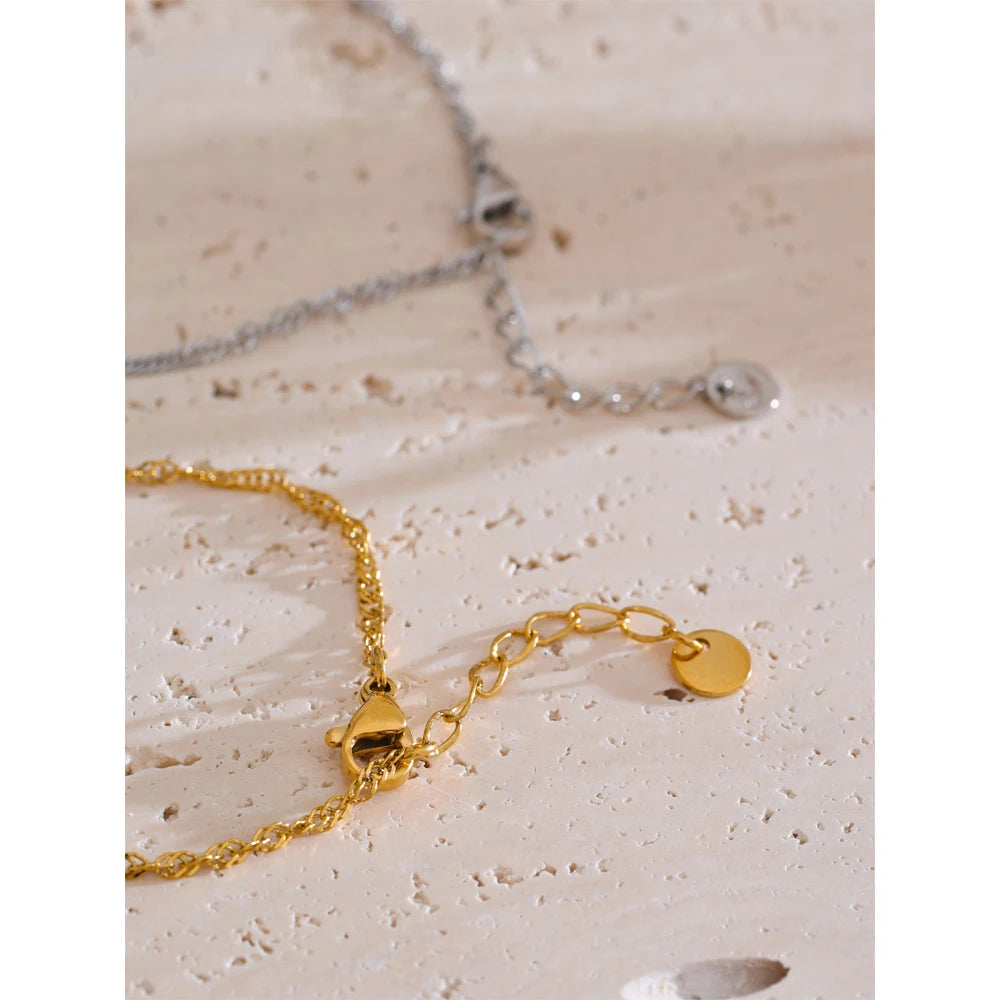 Elegant bracelet bracelets styling featuring a gold plated bracelet chain and link ring