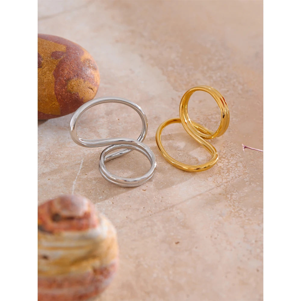 Polished stainless steel rings design with subtle gold plated glow