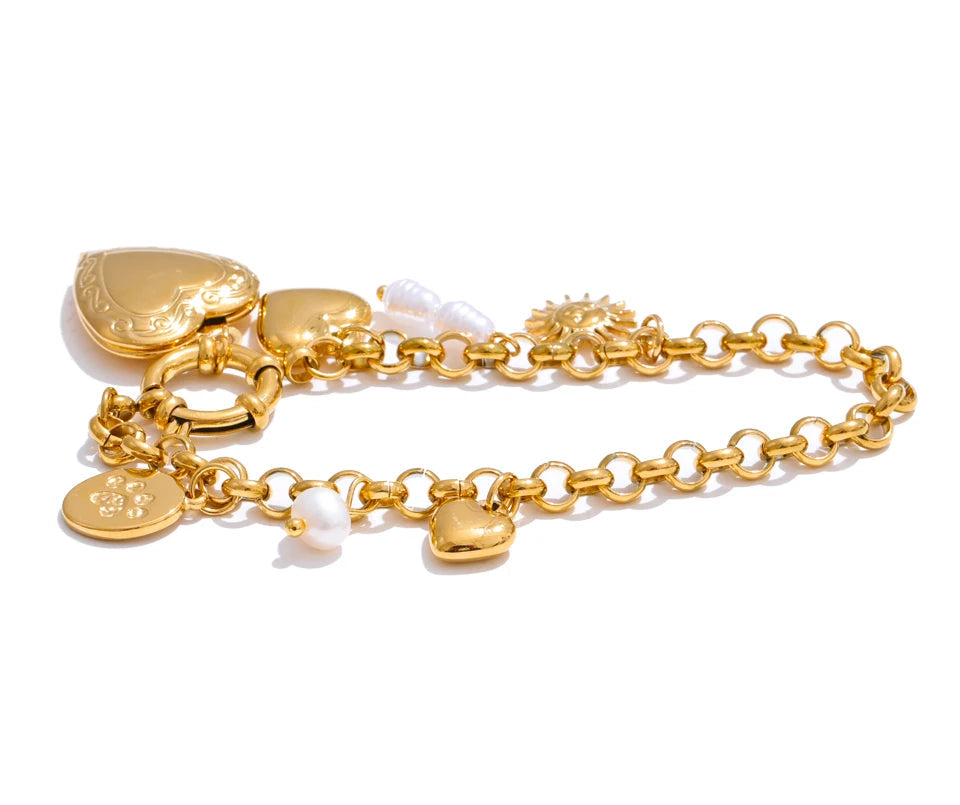 Product angle showing gold plated polish on a chain bracelet with bracelet charms