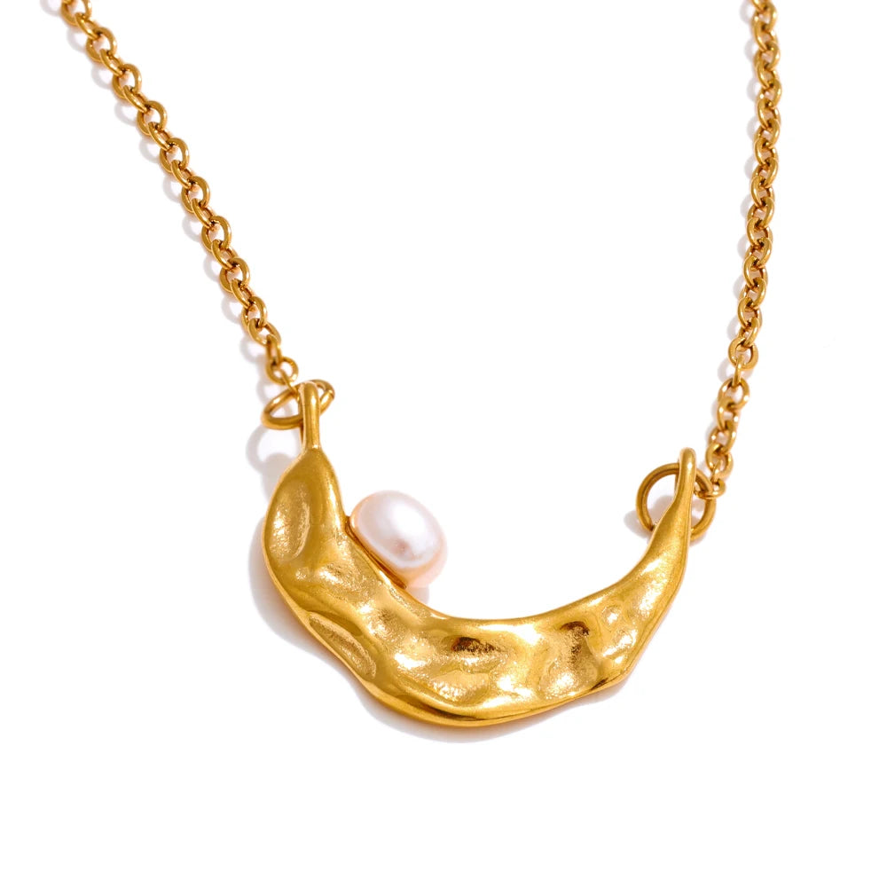 Gentle m oo n feeling in a charm necklace with pearl jewelry touch