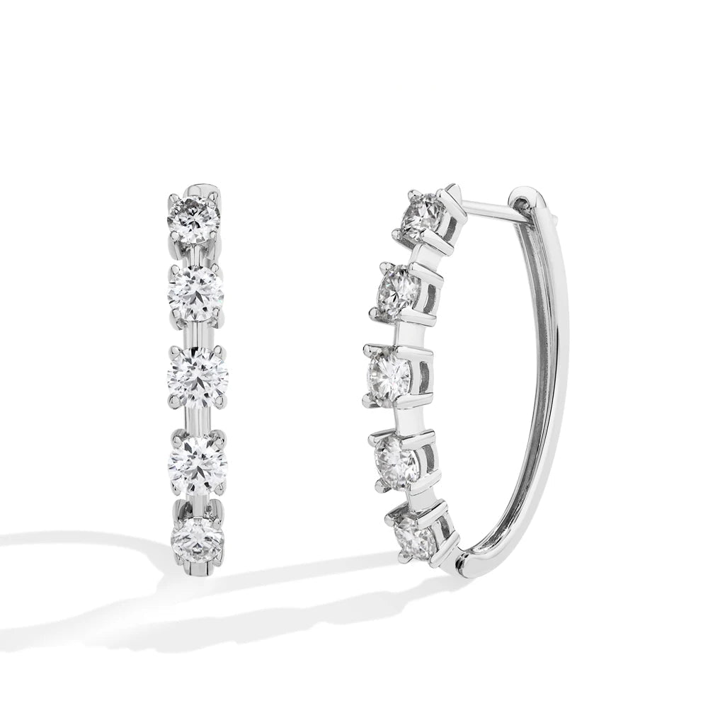 Gold plated moissanite earrings styled as elegant drop earrings gold