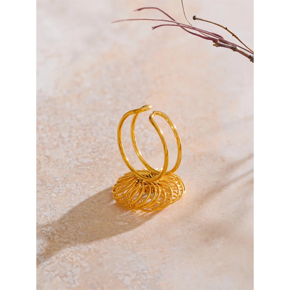 Adjustable ring with finger and ring flexibility showing open band: ring with size ready