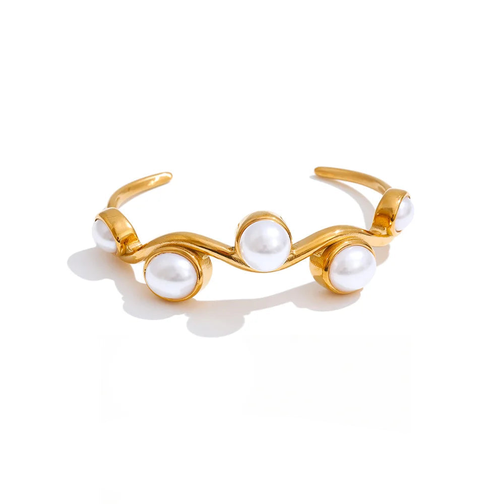 Pearl open cuff bracelet with polished gold plated shine