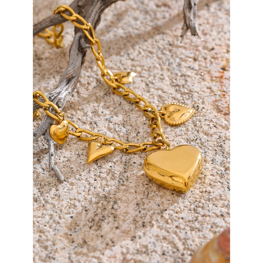 Charm on necklace detail showing refined movement and sleek finish