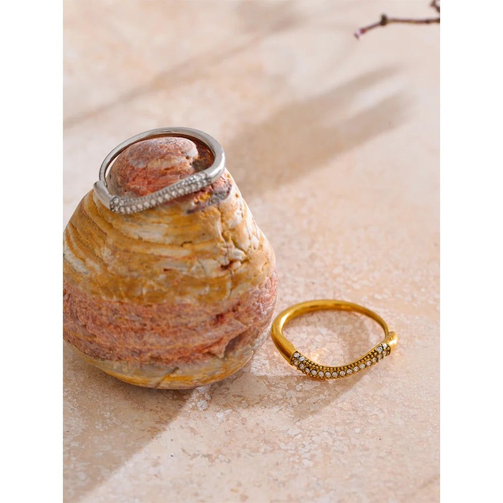 Stainless steel jewelry ring with gold plated finish designed for everyday wear