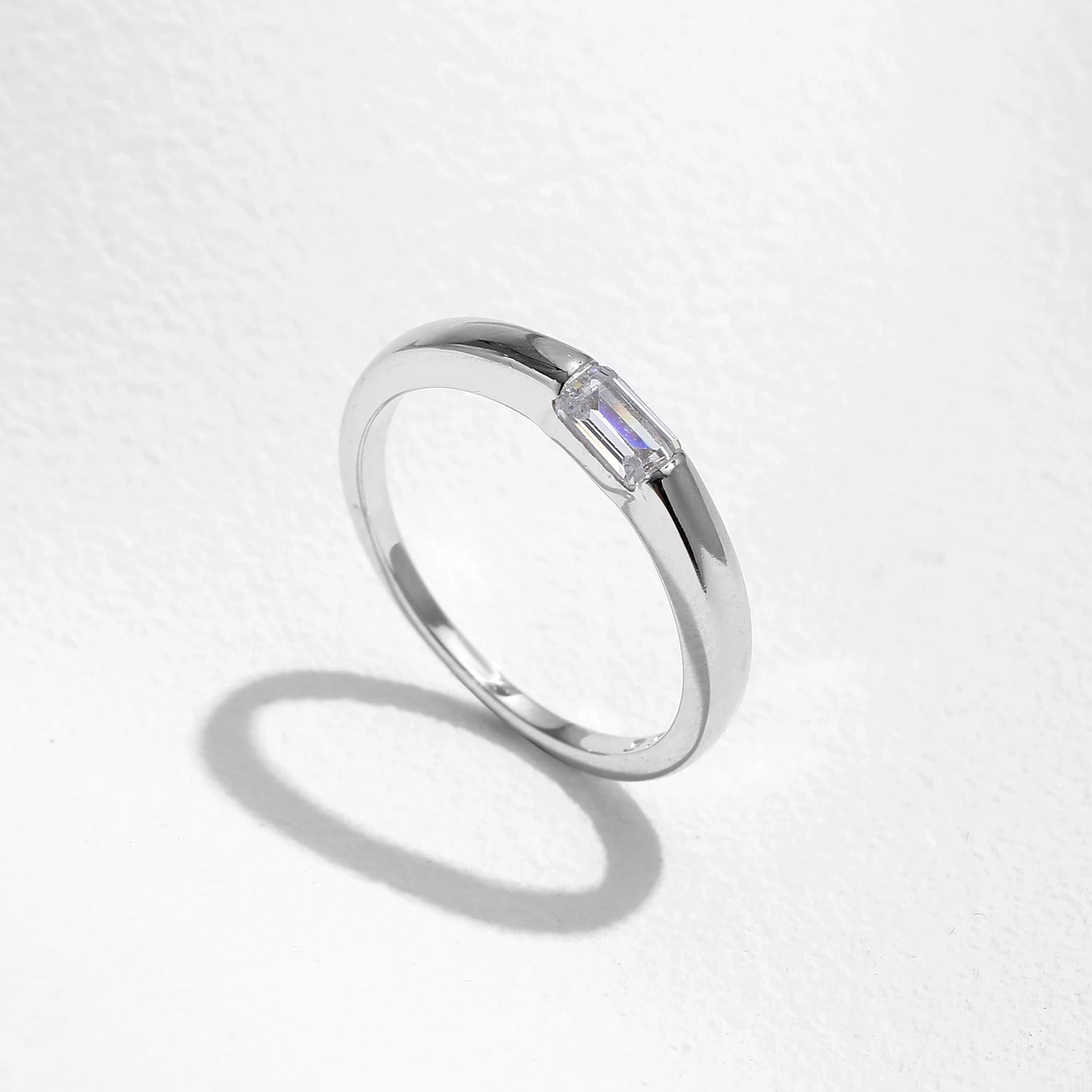 925 sterling silver stacking ring styled beside a classic 925 silver band