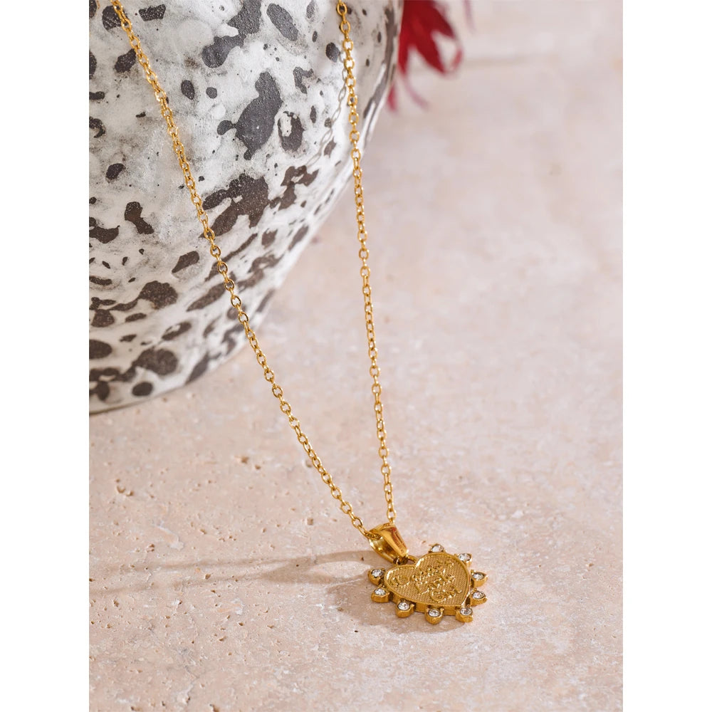 Close-up of pendant necklace gold in polished golden finish