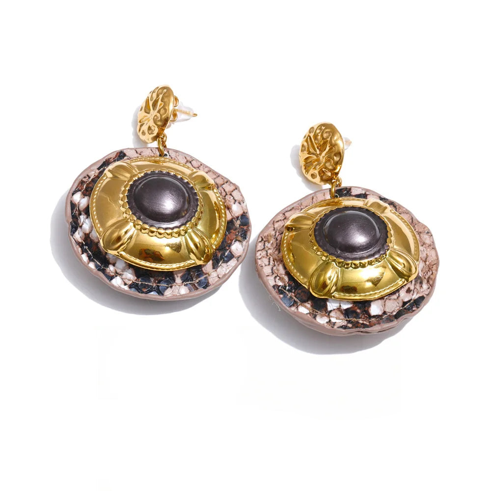 Black enamel snake earrings with polished gold plated shine