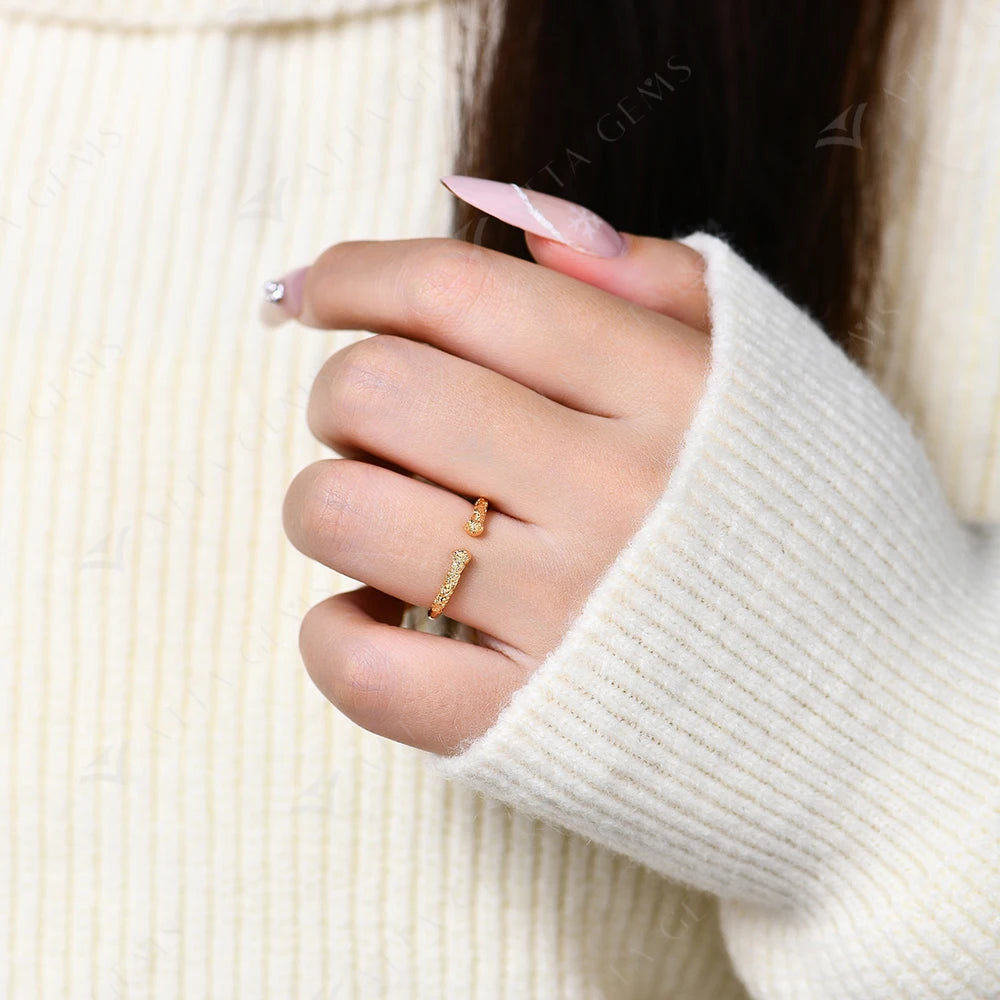 Gold ring engraved texture over silver base