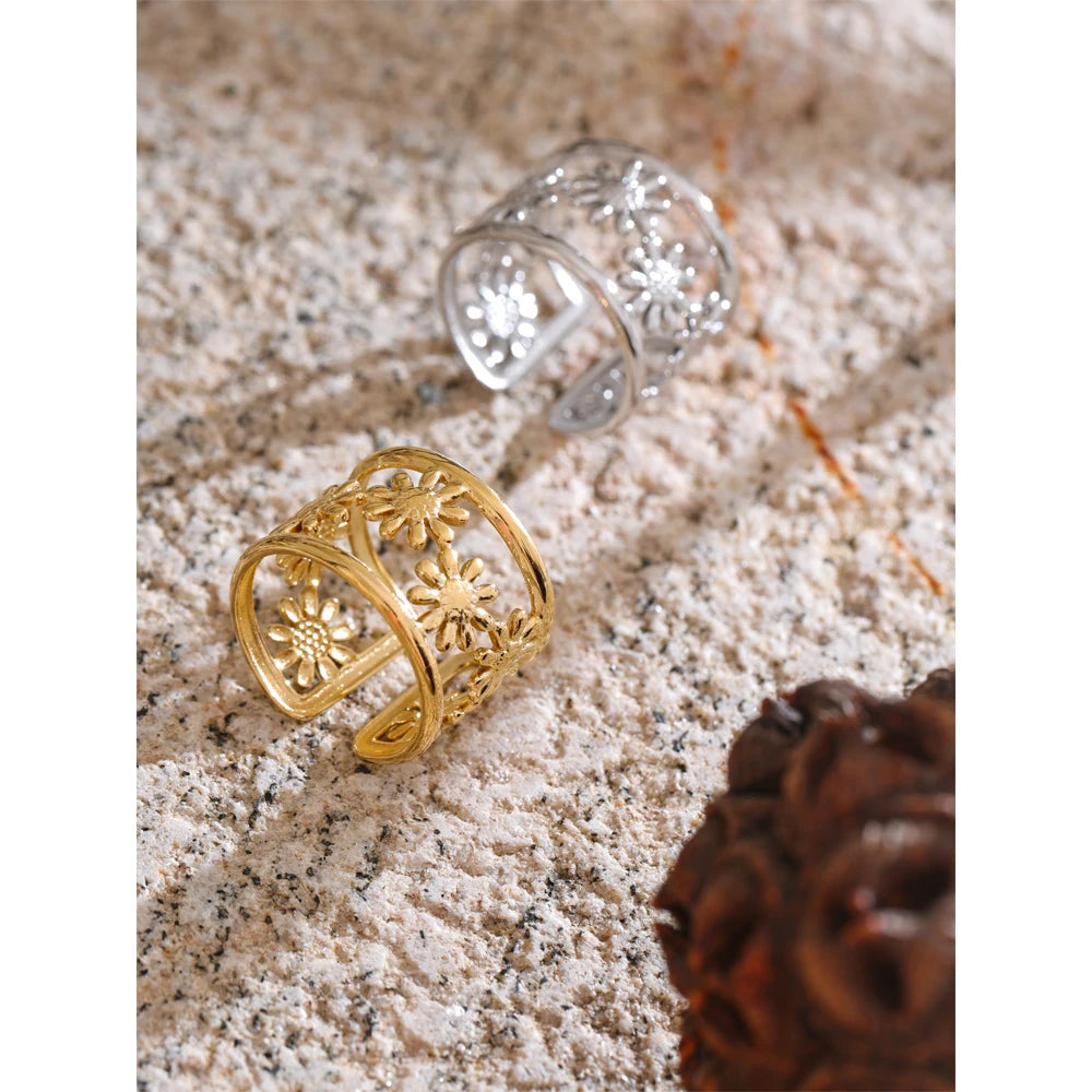 Close-up of dual-tone ring showing gold and platinum plated finish and hollow flower design